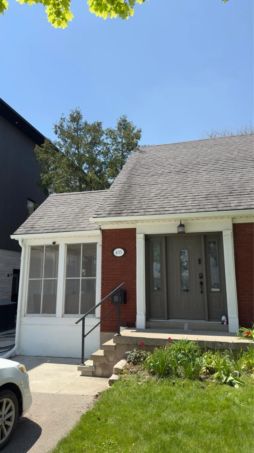 New seamless eavestrough installed on 1.5-storey red brick home — D&D Home Services